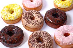 A selection of donuts with multicoloured icing